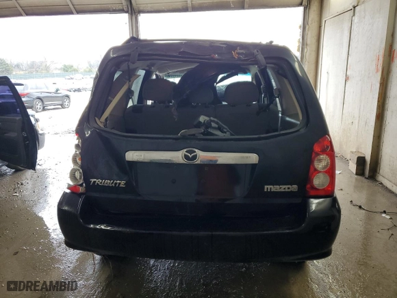 2006 Mazda Tribute LX with VIN 4F2YZ94126KM14426, listed as a Copart auction lot 85331974 with 214,950 mi miles and Salvage Title. Bid and sale history available at carsss.com. Image 6.