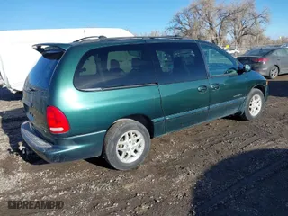 1999 Dodge Caravan SE with VIN 2B4GP44G9XR135970, listed as a IAAI auction lot 41714951 with 173,451 mi miles. Bid and sale history available at carsss.com. Image 4.