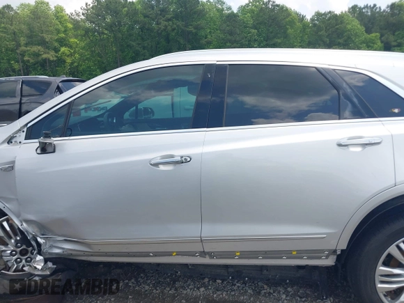 2018 Cadillac XT5 FWD with VIN 1GYKNARS4JZ142654, listed as a IAAI auction lot 42275794 with 112,790 mi miles and . Bid and sale history available at DreamBid. Image 14.