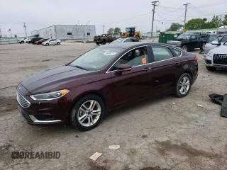 2018 Ford Fusion SE z VIN 3FA6P0HD2JR185298, wystawiony jako Copart lot #58898075 z przebiegiem Nie podano mil oraz Czysty tytuł • Clean title. Historia ofert i sprzedaży dostępna na DreamBid. Obrazek 1.