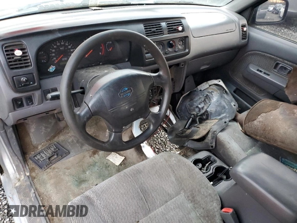 2000 Nissan Frontier XE z VIN 1N6ED27Y8YC368144, wystawiony jako Copart lot #87784565 z przebiegiem Nie podano mil oraz Czysty tytuł • Clean title. Historia ofert i sprzedaży dostępna na DreamBid. Obrazek 8.
