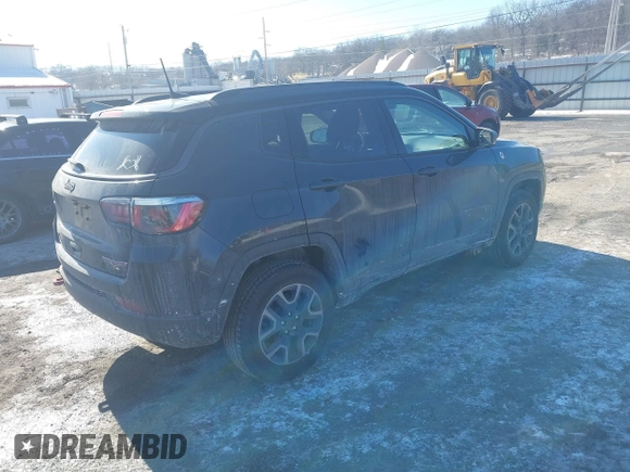 2018 Jeep Compass Trailhawk with VIN 3C4NJDDB5JT458112, listed as a IAAI auction lot 41617567 with 79,612 mi miles and . Bid and sale history available at carsss.com. Image 4.