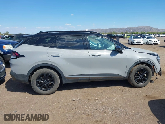 2023 Kia Sportage X-Pro Prestige z VIN 5XYK7CAF7PG091605, wystawiony jako IAAI lot #42414577 z przebiegiem 43 120 mil mil oraz . Historia ofert i sprzedaży dostępna na DreamBid. Obrazek 13.