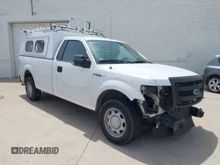 2014 Ford F-150 XL with VIN 1FTMF1CM7EKG22854, listed as a IAAI auction lot 42216801 with 140,542 mi miles and . Bid and sale history available at DreamBid. Image 1.