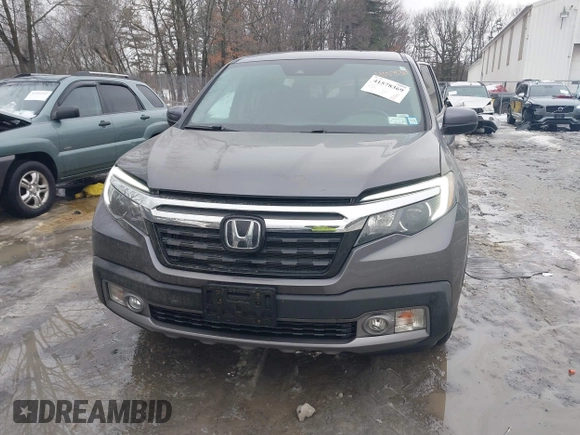 2020 Honda Ridgeline RTL-E with VIN 5FPYK3F70LB015422, listed as a IAAI auction lot 41578369 with 78,860 mi miles and . Bid and sale history available at DreamBid. Image 12.