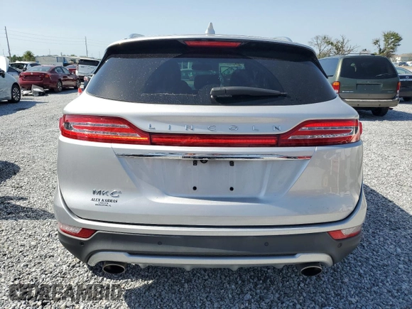 2019 Lincoln MKC Select with VIN 5LMCJ2C99KUL09924, listed as a Copart auction lot 57176145 with 55,094 mi miles and Salvage title. Bid and sale history available at DreamBid. Image 6.