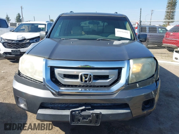 2009 Honda Pilot EX with VIN 5FNYF48439B036957, listed as a IAAI auction lot 41656284 with 199,115 mi miles. Bid and sale history available at carsss.com. Image 12.
