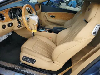 2013 Bentley Continental GT with VIN SCBGR3ZA0DC079677, listed as a Copart auction lot 82753764 with 58,406 mi miles and Salvage Title. Bid and sale history available at DreamBid. Image 7.