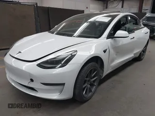 2023 Tesla Model 3 Long Range with VIN 5YJ3E1EB3PF603955, listed as a IAAI auction lot 41915541 with 33,691 mi miles and . Bid and sale history available at DreamBid. Image 2.