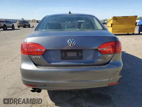 2014 Volkswagen Jetta SE with VIN 3VWD07AJXEM315231, listed as a Copart auction lot 58258075 with 99,860 mi miles and Salvage title. Bid and sale history available at DreamBid. Image 6.