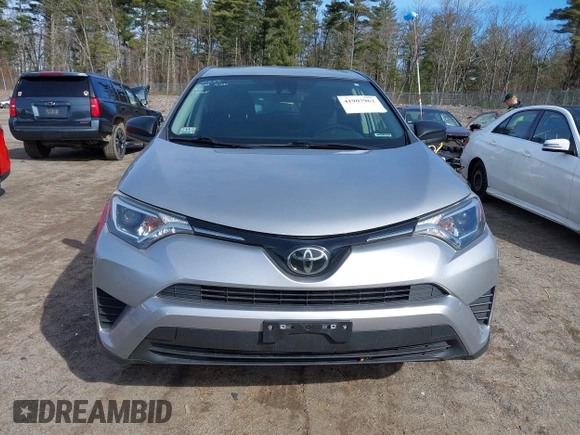 2018 Toyota RAV4 LE with VIN JTMBFREV8JJ224872, listed as a IAAI auction lot 41907962 with 104,605 mi miles and . Bid and sale history available at DreamBid. Image 12.
