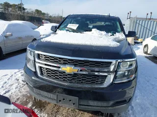 2019 Chevrolet Tahoe LT with VIN 1GNSKBKC7KR138999, listed as a IAAI auction lot 41339420 with 74,297 mi miles. Bid and sale history available at carsss.com. Image 12.