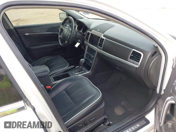 2012 Lincoln MKZ z VIN 3LNHL2GC5CR821004, wystawiony jako IAAI lot #41920319 z przebiegiem 91 081 mil mil oraz . Historia ofert i sprzedaży dostępna na DreamBid. Obrazek 5.