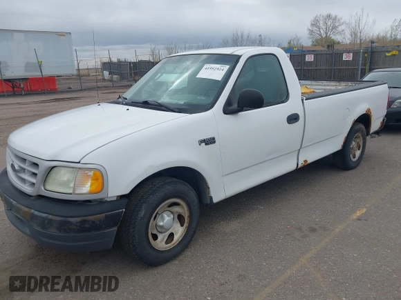 2003 Ford F-150 XL with VIN 1FTRF17273NA15637, listed as a IAAI auction lot 41952924 with 215,704 mi miles and . Bid and sale history available at DreamBid. Image 2.