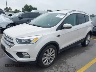 2018 Ford Escape Titanium with VIN 1FMCU9J98JUB87867, listed as a IAAI auction lot 42300123 with 48,357 mi miles and . Bid and sale history available at DreamBid. Image 17.