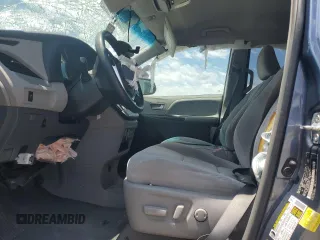 2015 Toyota Sienna LE with VIN 5TDJK3DC4FS107711, listed as a Copart auction lot 57693005 with 141,370 mi miles and Salvage title. Bid and sale history available at DreamBid. Image 7.