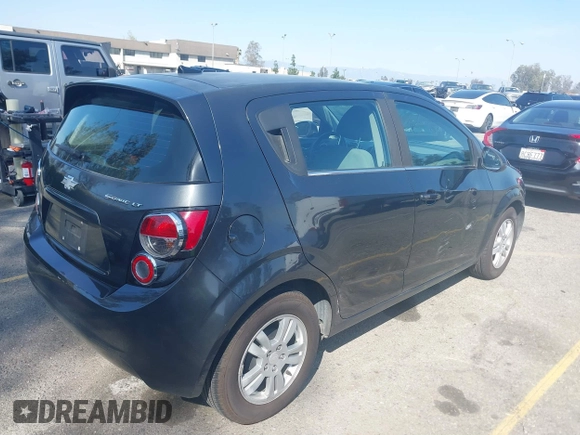 2014 Chevrolet Sonic LT with VIN 1G1JC6SG4E4118781, listed as a IAAI auction lot 41862192 with 124,375 mi miles. Bid and sale history available at carsss.com. Image 4.