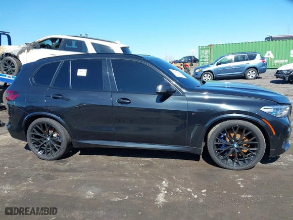 2019 BMW X5 xDrive50i with VIN 5UXJU2C5XKLN66873, listed as a IAAI auction lot 41472246 with 98,571 mi miles. Bid and sale history available at carsss.com. Image 12.
