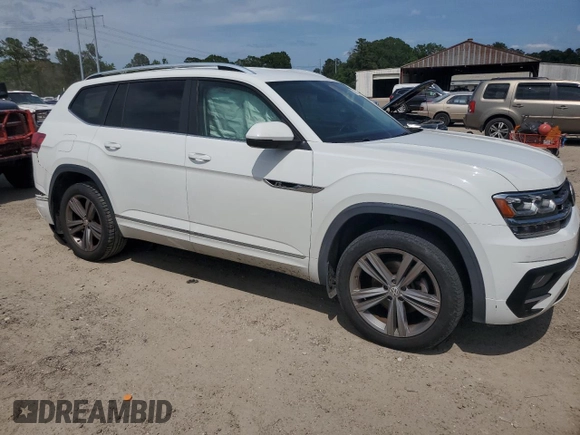 2018 Volkswagen Atlas SE with VIN 1V2PR2CA4JC520706, listed as a Copart auction lot 57173655 with 119,753 mi miles and Salvage title. Bid and sale history available at DreamBid. Image 4.