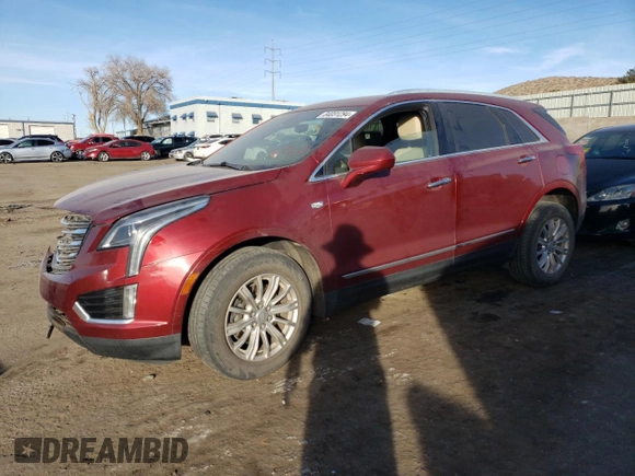 2018 Cadillac XT5 FWD with VIN 1GYKNARS2JZ241702, listed as a Copart auction lot 84031294 with 67,866 mi miles and Salvage title. Bid and sale history available at DreamBid. Image 1.