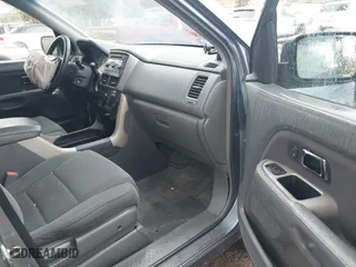 2007 Honda Pilot EX with VIN 2HKYF18437H528868, listed as a IAAI auction lot 41762030 with 203,212 mi miles. Bid and sale history available at carsss.com. Image 5.