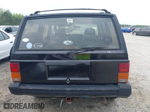 1994 Jeep Cherokee Sport with VIN 1J4FJ68S1RL160023, listed as a IAAI auction lot 41968610 with 255,978 mi miles. Bid and sale history available at carsss.com. Image 16.