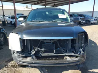 2008 GMC Yukon SLT w/4SB with VIN 1GKFC13J38R172711, listed as a IAAI auction lot 42067841 with 141,763 mi miles. Bid and sale history available at carsss.com. Image 13.