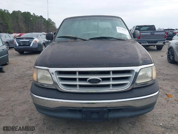 1999 Ford F-150 Work Series with VIN 1FTRX17W7XNC31381, listed as a IAAI auction lot 41734799 with 122,035 mi miles. Bid and sale history available at carsss.com. Image 6.