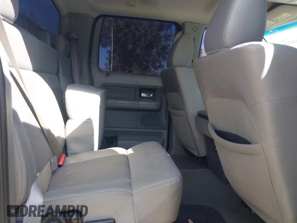 2007 Ford F-150 XLT with VIN 1FTRW12W47KC10337, listed as a IAAI auction lot 41568915 with 189,685 mi miles. Bid and sale history available at carsss.com. Image 8.