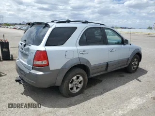 2006 Kia Sorento LX z VIN KNDJD733265572903, wystawiony jako Copart lot #56123945 z przebiegiem 185 664 mil mil oraz Szkoda całkowita • Salvage title. Historia ofert i sprzedaży dostępna na DreamBid. Obrazek 3.