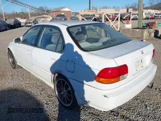 1997 Honda Civic LX with VIN 1HGEJ6571VL028196, listed as a IAAI auction lot 41429128 with 398,114 mi miles. Bid and sale history available at carsss.com. Image 3.