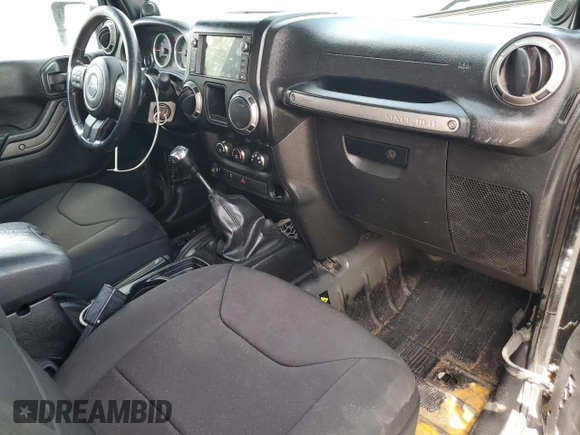 2014 Jeep Wrangler Sport with VIN 1C4AJWAG1EL200181, listed as a Copart auction lot 61165595 with 101,234 mi miles and Salvage title. Bid and sale history available at DreamBid. Image 8.