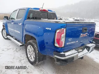 2018 GMC Canyon 4WD SLT with VIN 1GTG6DEN4J1135258, listed as a IAAI auction lot 41591180 with 66,820 mi miles. Bid and sale history available at carsss.com. Image 3.