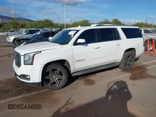 2015 GMC Yukon XL SLT with VIN 1GKS1HKC2FR612690, listed as a IAAI auction lot 41234188 with 113,830 mi miles. Bid and sale history available at carsss.com. Image 17.