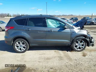 2013 Ford Escape SEL with VIN 1FMCU0HX2DUA51416, listed as a IAAI auction lot 41689474 with 140,596 mi miles and . Bid and sale history available at DreamBid. Image 14.