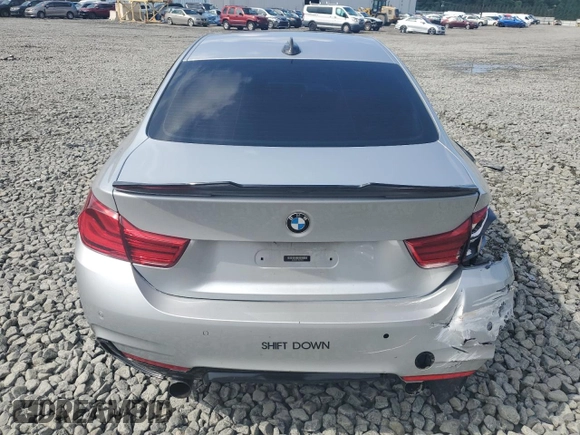 2016 BMW 4 Series 435i xDrive with VIN WBA3R5C51GK374233, listed as a Copart auction lot 61510975 with 97,999 mi miles and Salvage title. Bid and sale history available at DreamBid. Image 6.