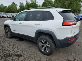 2014 Jeep Cherokee Trailhawk with VIN 1C4PJMBS8EW156633, listed as a Copart auction lot 58197675 with 133,029 mi miles and Clean title. Bid and sale history available at DreamBid. Image 2.