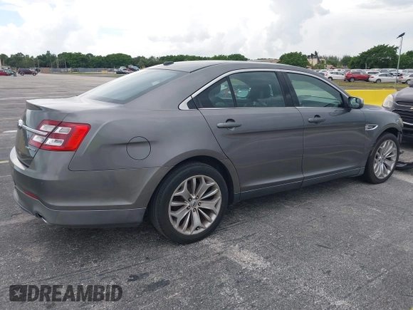 2014 Ford Taurus Limited with VIN 1FAHP2F8XEG115507, listed as a IAAI auction lot 42479603 with 160,986 mi miles and . Bid and sale history available at DreamBid. Image 4.