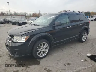 2013 Dodge Journey R/T with VIN 3C4PDDFG0DT657405, listed as a Copart auction lot 77076434 with 146,298 mi miles and Clean title. Bid and sale history available at DreamBid. Image 1.