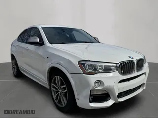 2018 BMW X4 M40i with VIN 5UXXW7C53J0W65097, listed as a Copart auction lot 54391035 with 133,367 mi miles and Clean Title. Bid and sale history available at carsss.com. Image 1.
