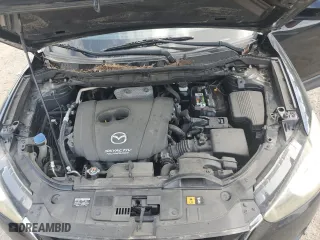 2014 Mazda CX-5 Touring with VIN JM3KE2CY7E0427312, listed as a Copart auction lot 52869335 with 192,903 mi miles and Salvage Title. Bid and sale history available at carsss.com. Image 11.