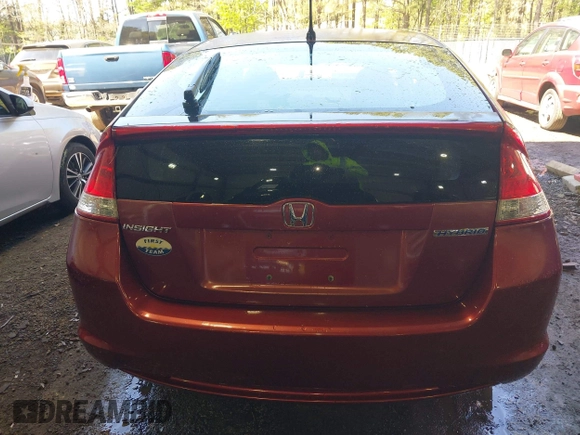 2010 Honda Insight EX z VIN JHMZE2H7XAS001280, wystawiony jako IAAI lot #41982398 z przebiegiem 142 434 mil mil oraz . Historia ofert i sprzedaży dostępna na DreamBid. Obrazek 16.