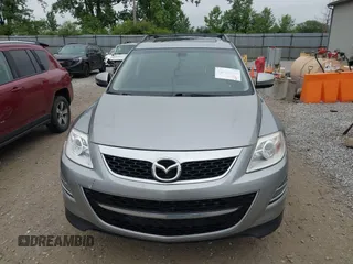 2012 Mazda CX-9 Grand Touring z VIN JM3TB3DA0C0337713, wystawiony jako IAAI lot #42368488 z przebiegiem 184 220 mil mil oraz . Historia ofert i sprzedaży dostępna na DreamBid. Obrazek 12.
