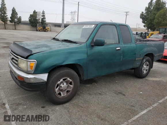 1996 Toyota T100 DX z VIN JT4TN12D2T0026690, wystawiony jako Copart lot #52937955 z przebiegiem 287 729 mil mil oraz Tytuł czysty. Historia ofert i sprzedaży dostępna na DreamBid. Obrazek 1.