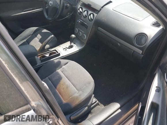 2005 Mazda 6 Sport S with VIN 1YVHP80DX55M60044, listed as a IAAI auction lot 42181650 with 161,463 mi miles and . Bid and sale history available at DreamBid. Image 5.
