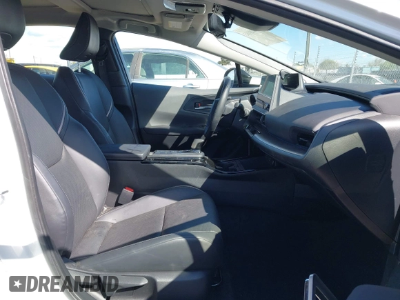 2023 Toyota Prius LE with VIN JTDACAAUXP3012538, listed as a IAAI auction lot 41948103 with 33,338 mi miles and . Bid and sale history available at DreamBid. Image 5.