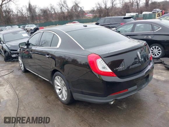 2014 Lincoln MKS with VIN 1LNHL9EK7EG609329, listed as a IAAI auction lot 41555819 with 89,849 mi miles. Bid and sale history available at carsss.com. Image 3.