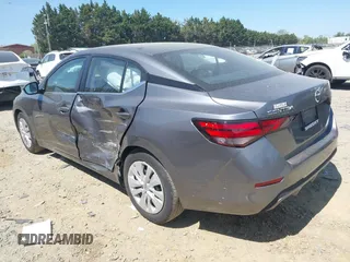 2023 Nissan Sentra S z VIN 3N1AB8BV0PY306169, wystawiony jako IAAI lot #42107143 z przebiegiem 28 156 mil mil oraz . Historia ofert i sprzedaży dostępna na DreamBid. Obrazek 3.