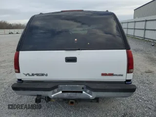 1997 GMC Yukon with VIN 1GKEK13R4VJ700223, listed as a Copart auction lot 49840845 with 231,512 mi miles and Salvage Title. Bid and sale history available at carsss.com. Image 6.