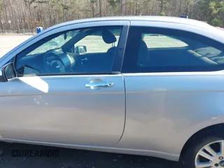 2008 Ford Focus SE with VIN 1FAHP33N48W114038, listed as a IAAI auction lot 41533744 with 143,065 mi miles. Bid and sale history available at carsss.com. Image 13.